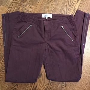 Jolt pants. Maroon. Zipper front pockets. Size 5.